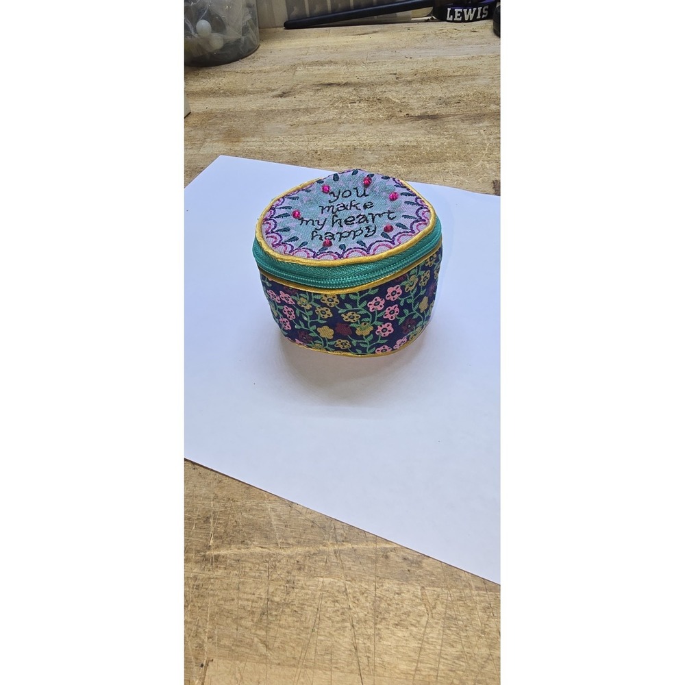 Natural Life embroidered jewelry round travel case with a beaded zipper